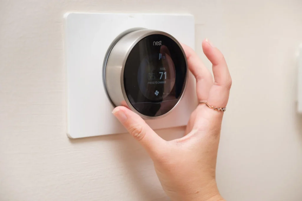 | Patrick Riley Services Nest Smart Thermostat in Phoenix home for energy efficiency and climate control.
